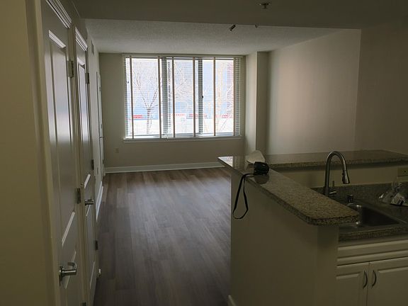 View from entry - first door on immediate left (not pictured) to bathroom - first door on left (pictured) cost closet - second door on left (pictured) washer/dryer