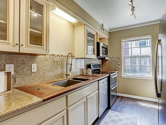 5th image of 12729 Huntingwick Dr #158
