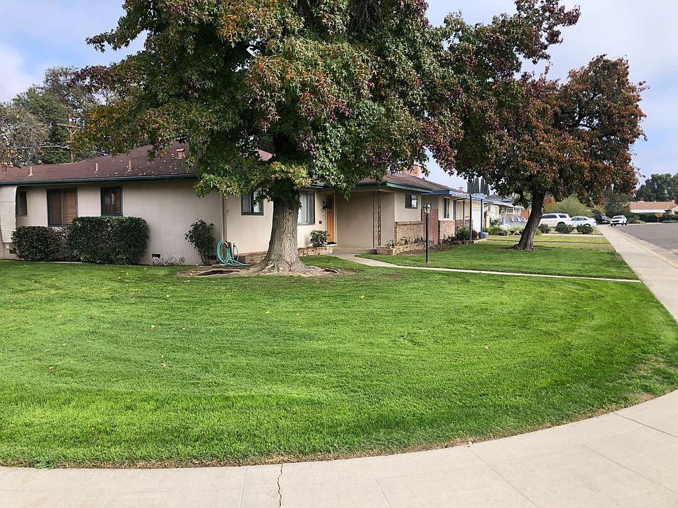 Beautiful double lot with extra RV parking space in fenced area.