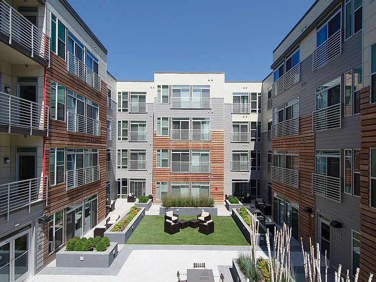 Building exterior and courtyard with grills