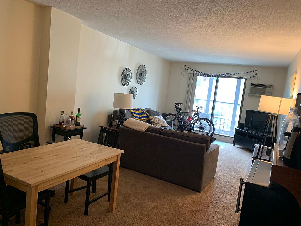 Living Room with Sliders to a Screened in Balcony