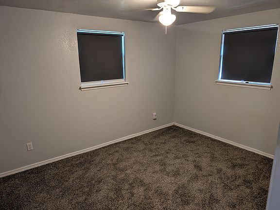 Secondary bedroom, all new outlets throughout house, blackout blinds and carpet