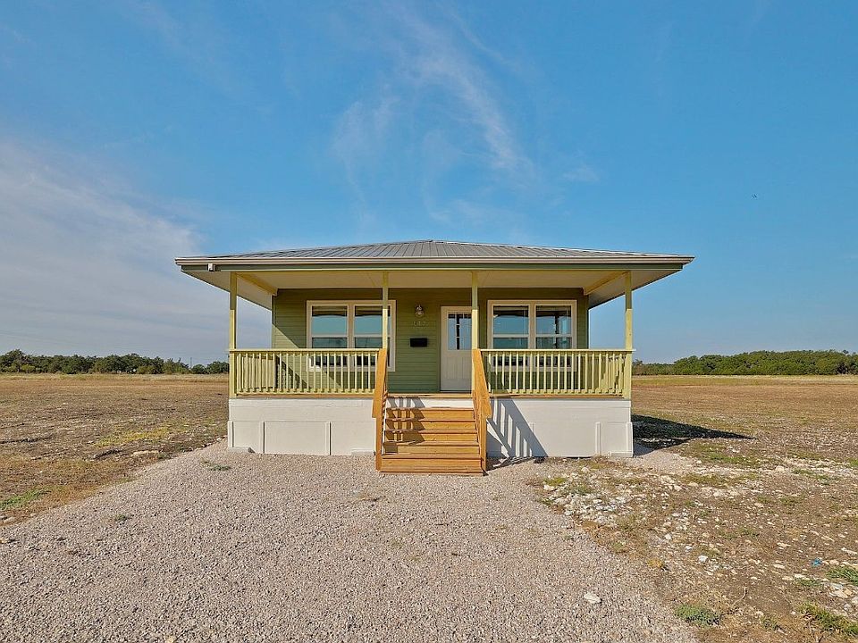 Front elevation of the house. with a wonderful front porch