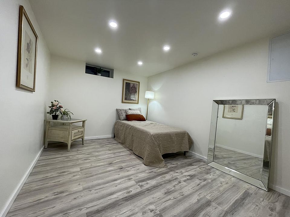 Modern recessed lighting creates the perfect ambiance for reading, relaxing, or unwinding after a long day.