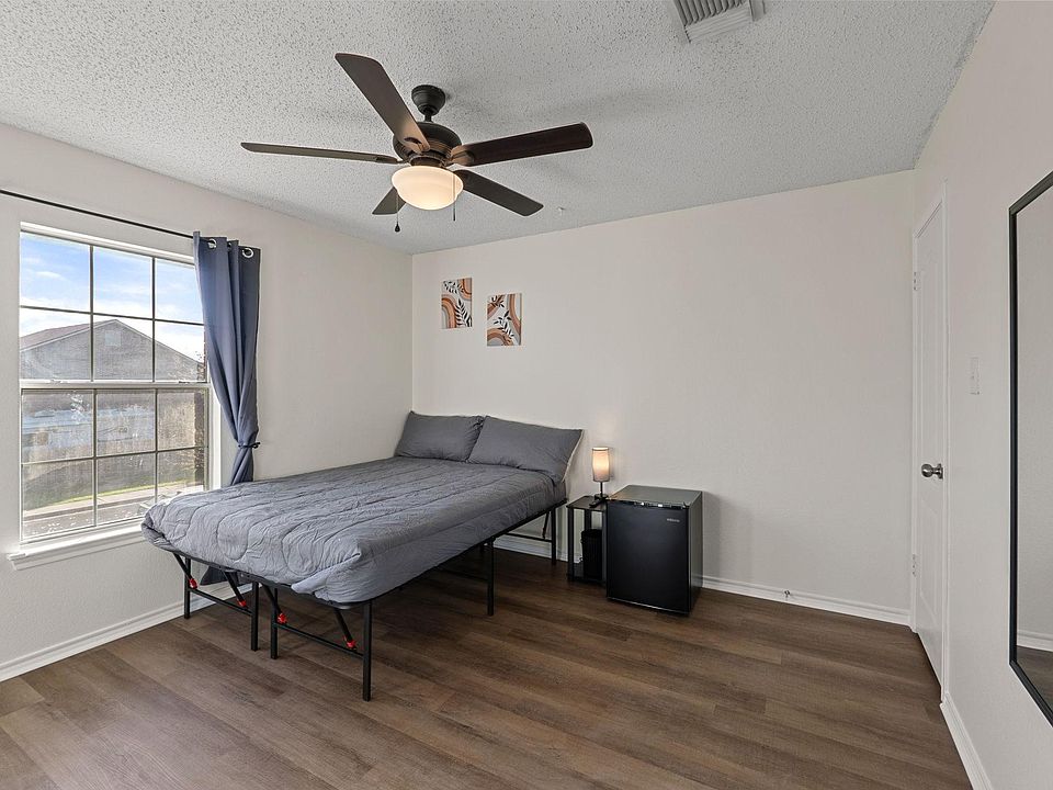 Bedroom large windows to bring in natural light.