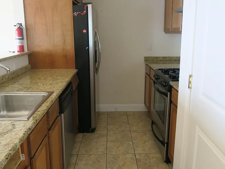 Kitchen with stainless steen appliances.