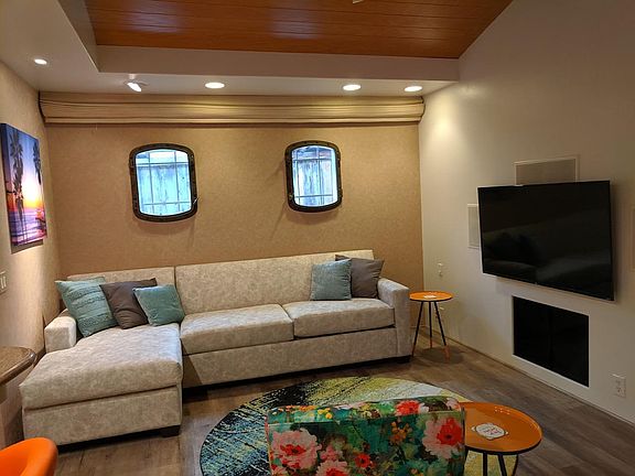 New, custom Sofa with upgraded queen mattress
