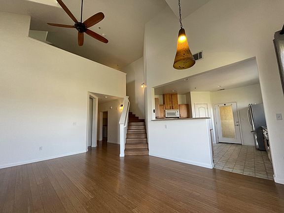 Living area w/ stairs to loft