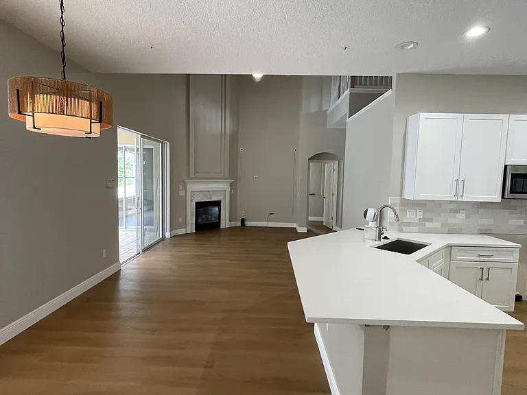 Kitchen, informal dining and living room