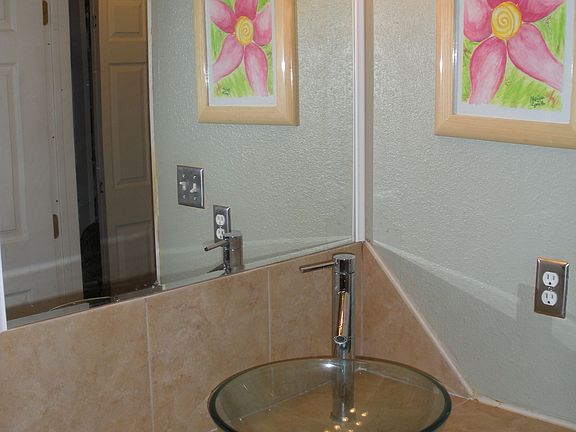 New Italian porcelain tile vanity with glass basin sink, new lighting/fan