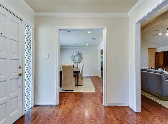 Front door leads to the warm inviting foyer.