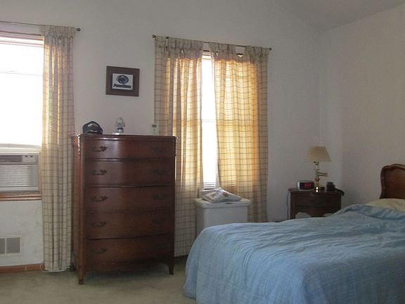 master bedroom with cathedral ceilings