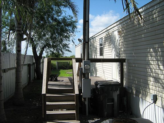 DECK ON OPPOSITE SIDE OF HOME