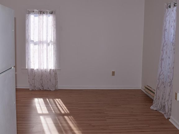 Entering the door to kitchen, dining, and living room. Open lay out.