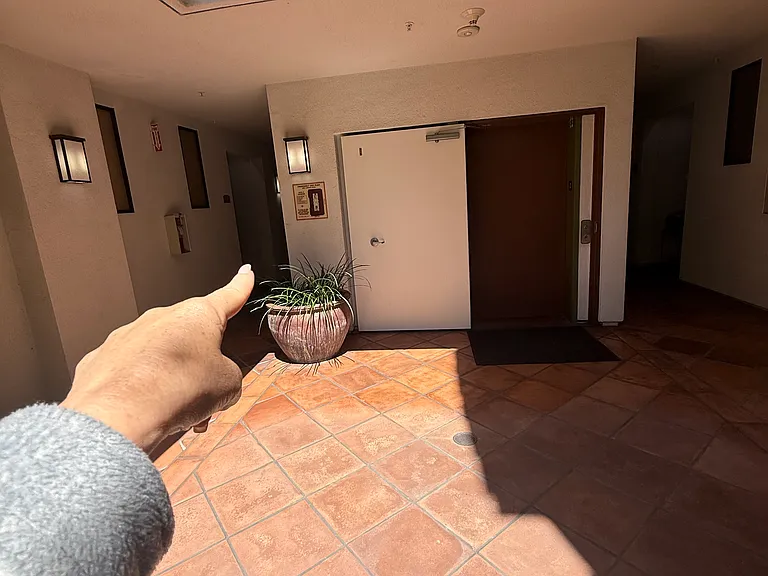 Coming from the elevator, the unit is located down the hall on the left side.