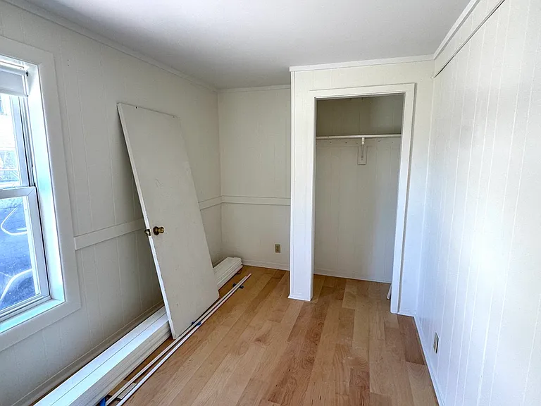 Bedroom 3: smaller, downstairs, with closet