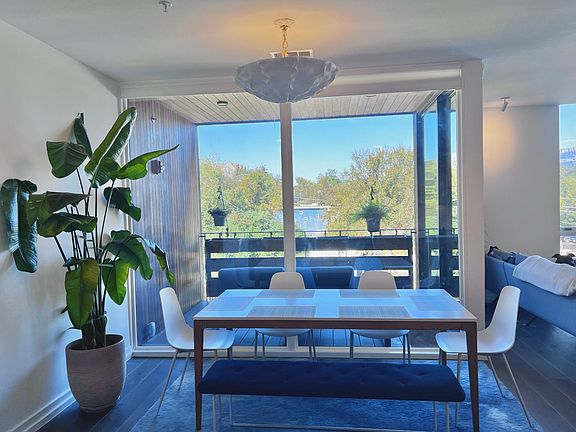 Dining area with large floor to ceiling windows