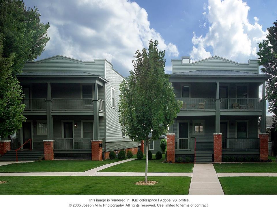 Front of townhouse building on left