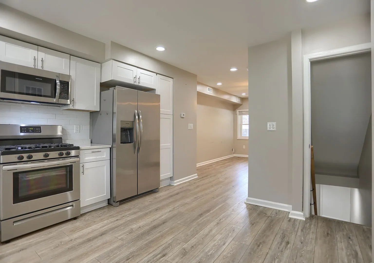 Bare 2BR/2BA Row Home in Baltimore Ready for Immediate Move-In! — Photo 1