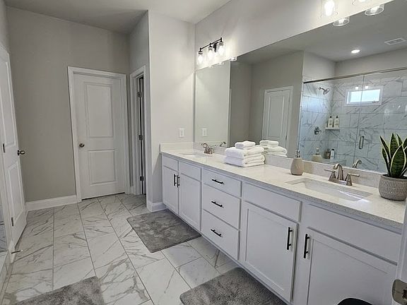 Huge master bath with His and Her Vanity + separate Shower