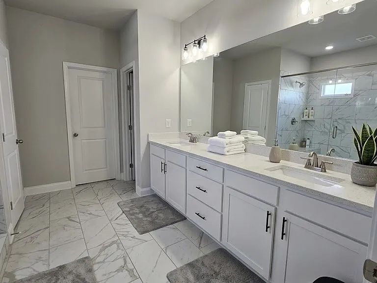 Huge master bath with His and Her Vanity + separate Shower