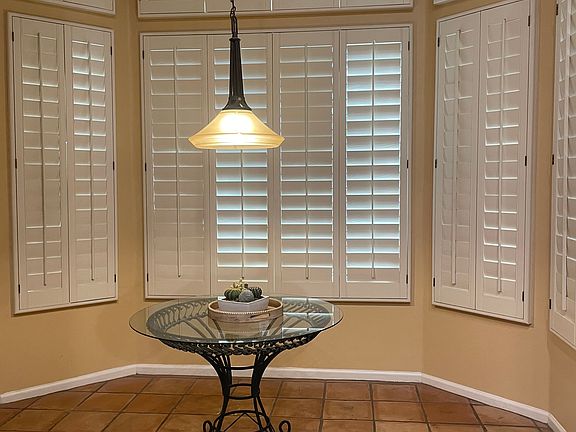 Eat in Kitchen with 4.5 inch Plantation shutters. Shutters also in the Office, Living room, Dining room and Family room