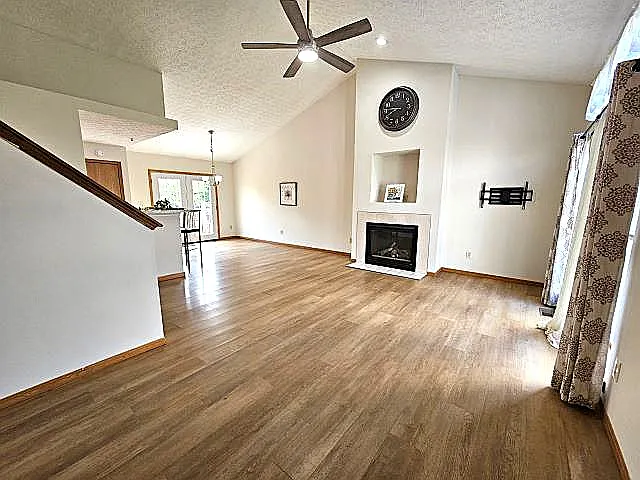 View of great rm, fireplace and dining area.