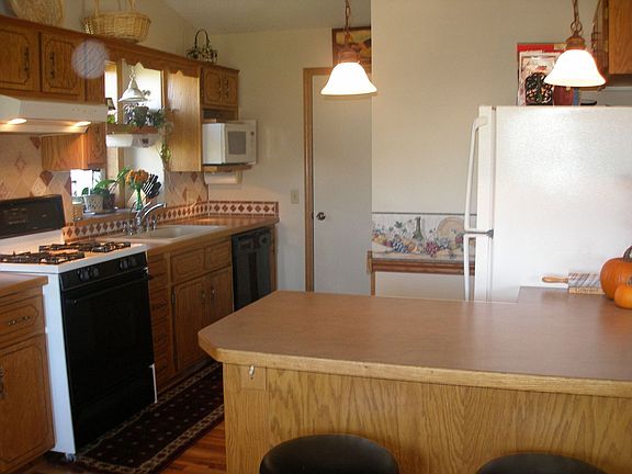 Kitchen with Breakfast Bar and Pantry