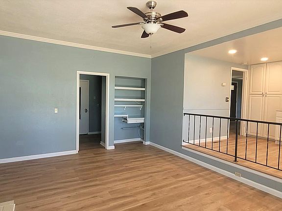 Family room with fire place path to garage