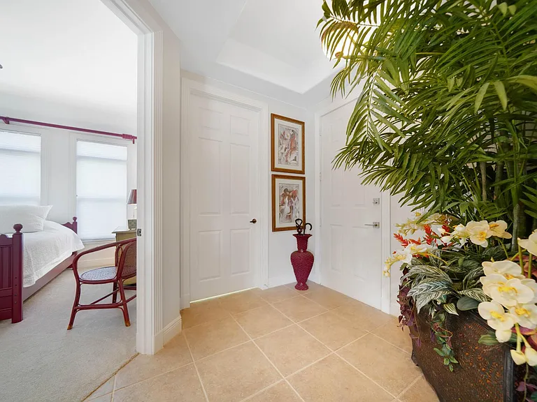 Guest room, Ensuite Laundry door, front entry door to right.