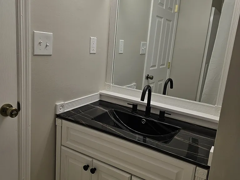 Different view of sink/vanity.