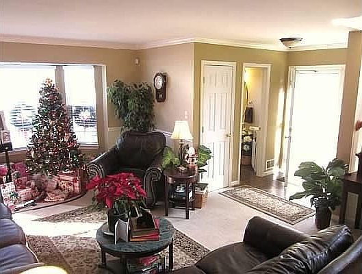 Living room foyer and entrance to half bath