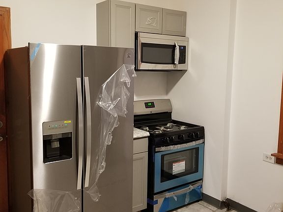 4th image of 7659 S Langley Ave
