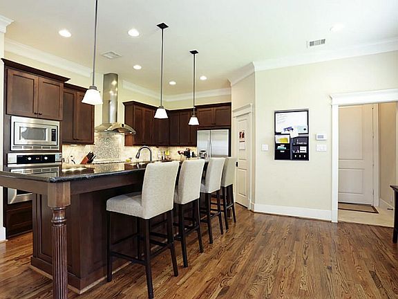 Grand kitchen with a breakfast nook featuring room for a breakfast table.