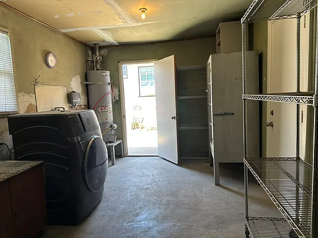 Inside of the storage and laundry room