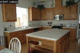 gourmet kitchen with stainless steel appliances