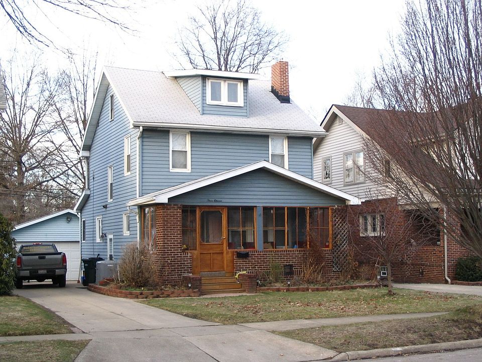 Front with view of 2 car Garage