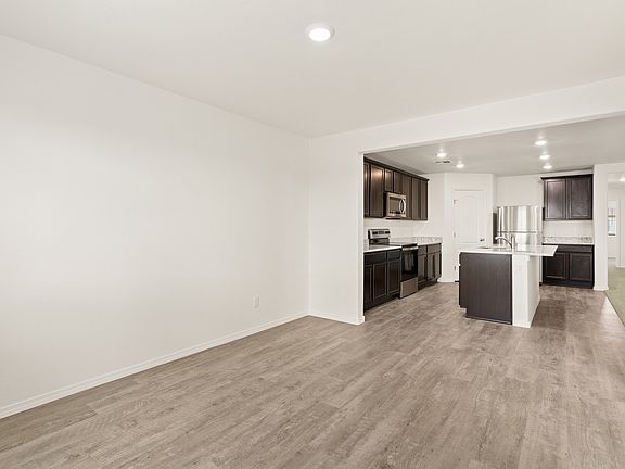 Formal dining room adjacent to the kitchen makes hosting dinner a breeze.