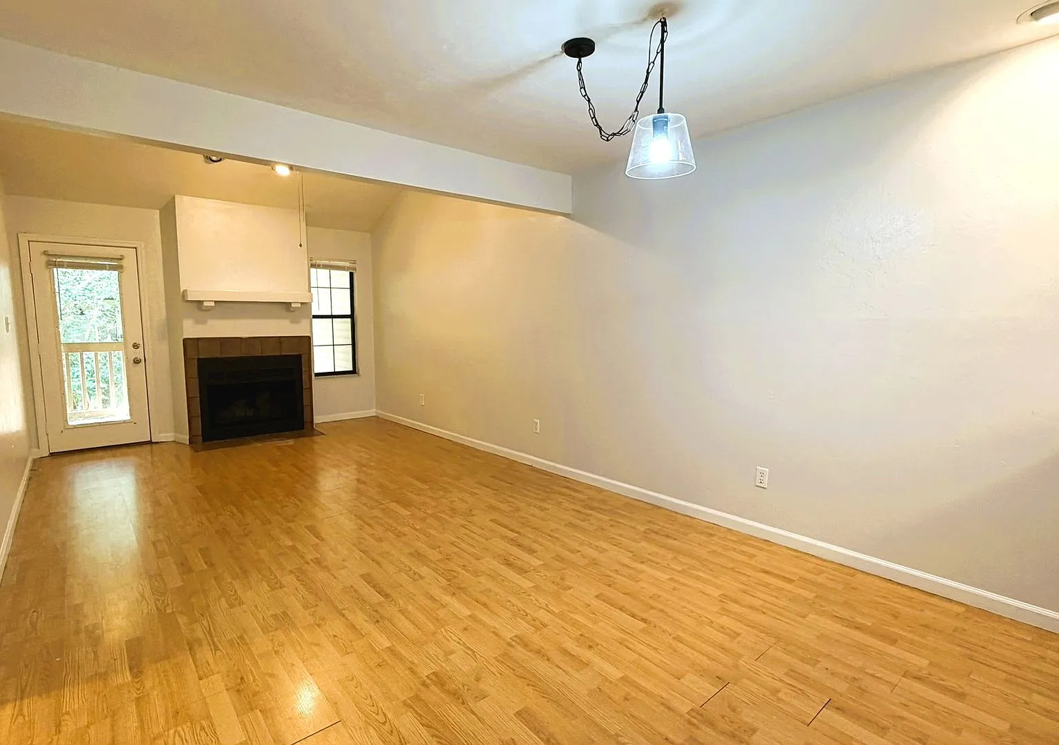 Fabulous 2/2 W/ Fireplace, Deck, Washer/Dryer, & Community Pool! $1200/Month Avail Now! — Photo 2
