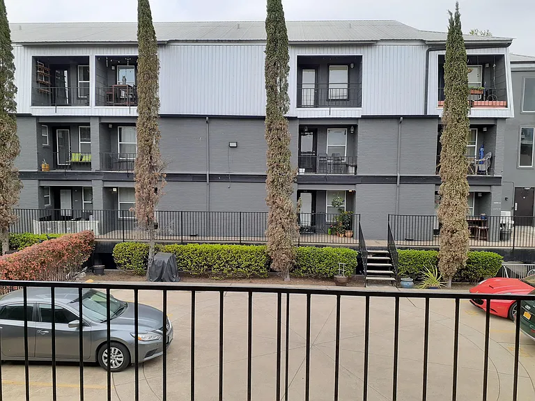 VIEW OF PARKING LOT FROM FRONT DOOR