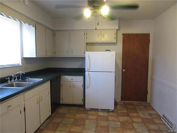 kitchen with loads of cabinets and counter space.