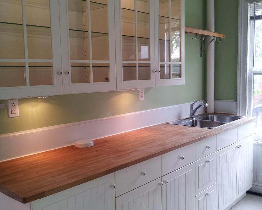 Chopping block counter and illuminated cabinets