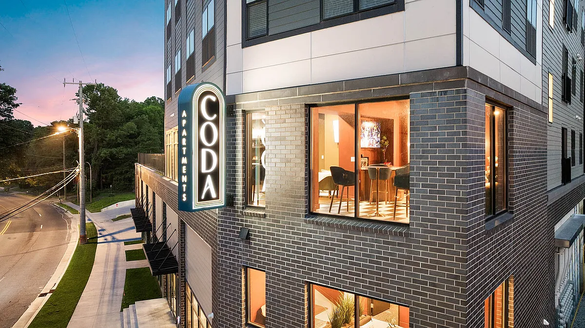 CODA sign at night with more exterior - CODA