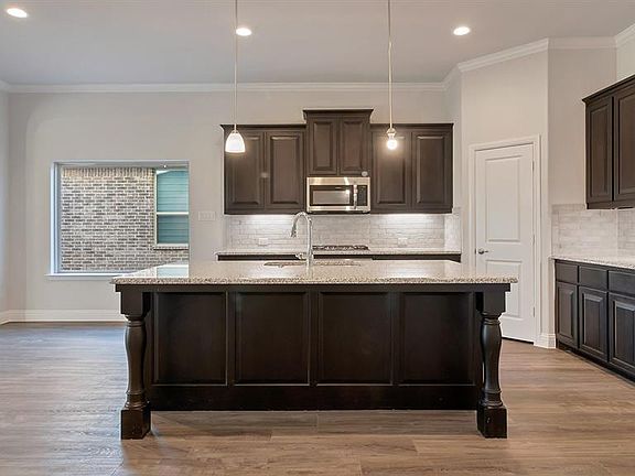 Kitchen - All Home and community information, including pricing, included features, terms, availability and amenities, are subject to change at any time without notice or obligation. All Drawings, pictures, photographs, video, square footages, floor plans, elevations, features, colors and sizes are approximate for illustration purposes only and will vary from the homes as built.