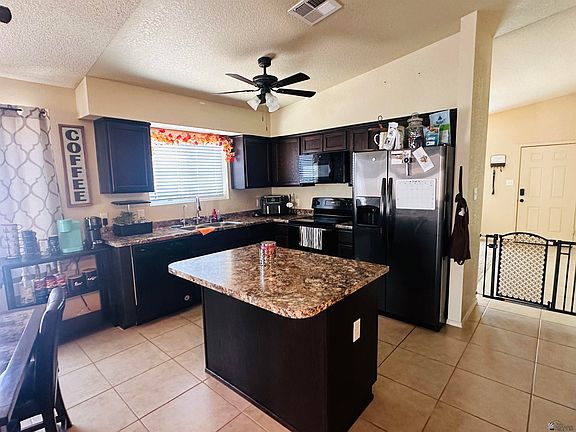 5th image of 7028 E 37th Pl