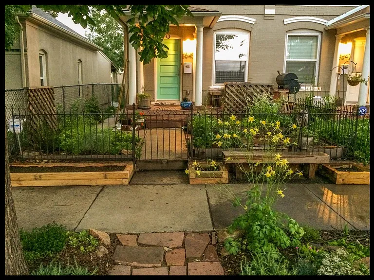 Front of House with Garden Beds & Porch