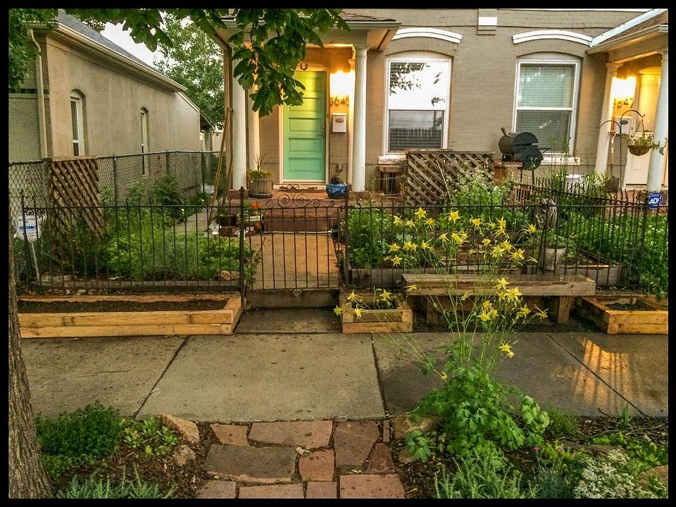 Front of House with Garden Beds & Porch