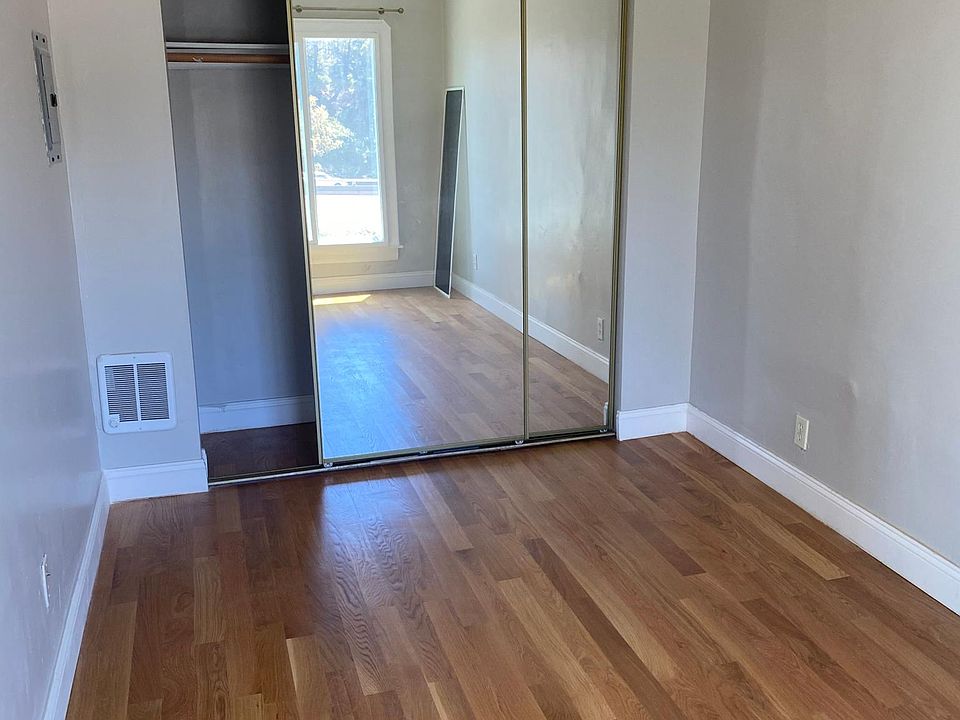 bedroom 2- mirrored closet space in bedroom