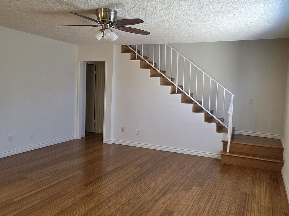 living room, stairs to bedrooms, hall has closet and half bathroom