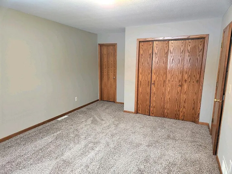 Master bedroom with large closets and direct access to upstairs bathroom.
